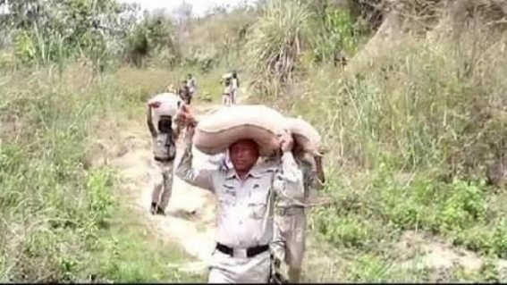 Tripura Police carrying heavy sacks of rations amid COVID19 Emergency, goes viral in social media